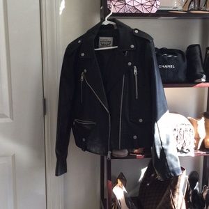 Levi’s Black faux leather moto jacket.